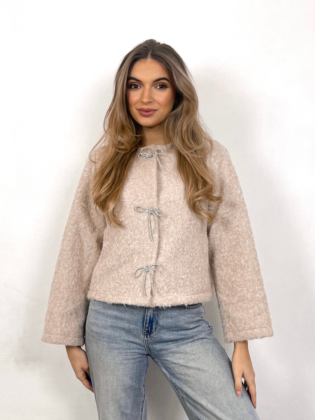 Cream glitter bow sweater