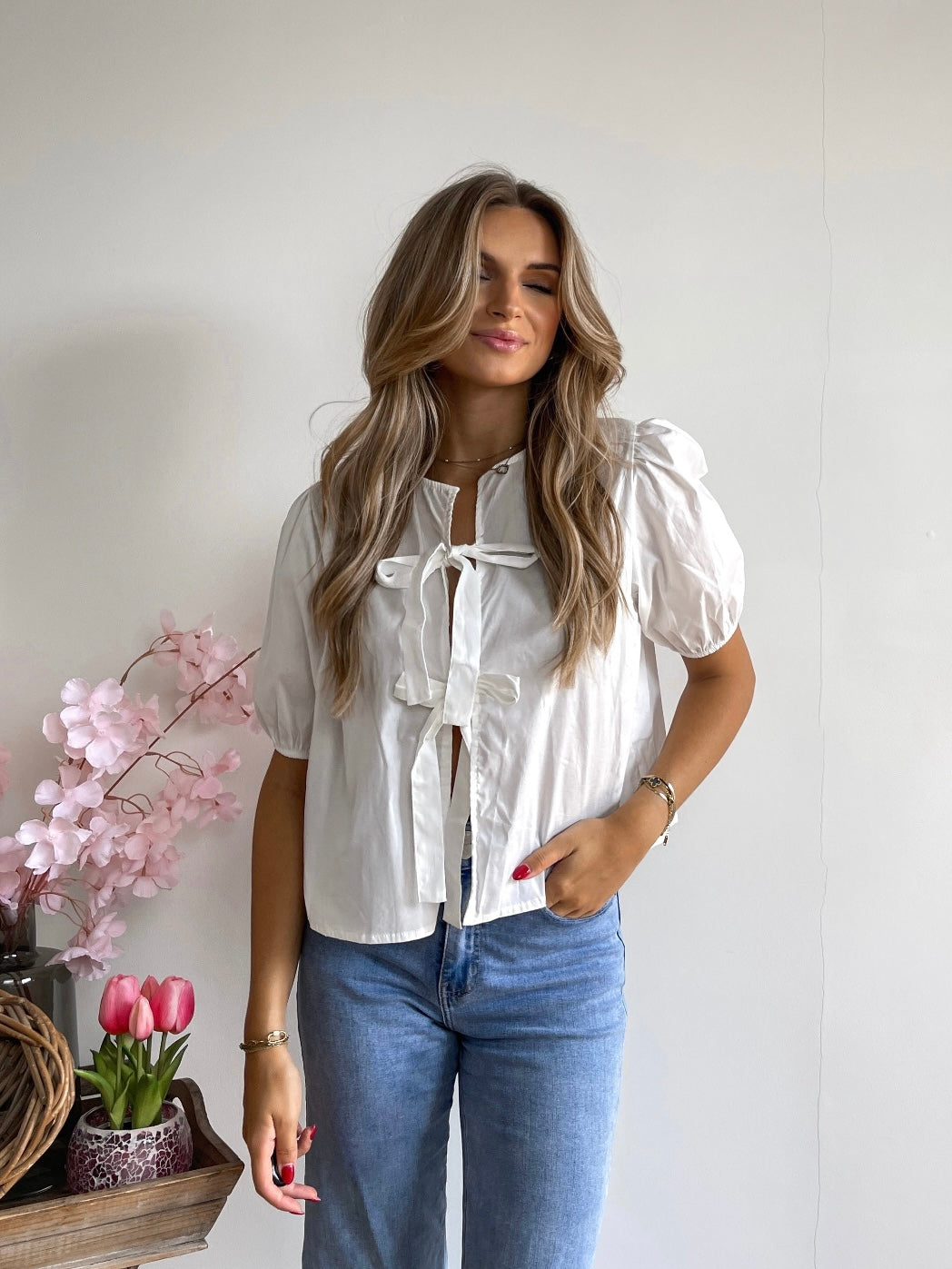 White bow blouse