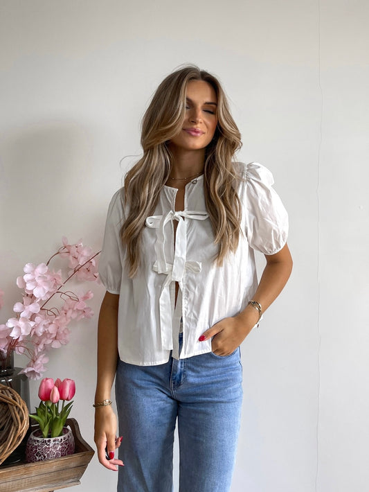 White bow blouse