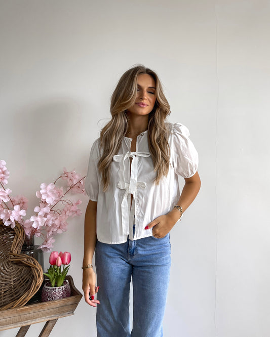 White bow blouse