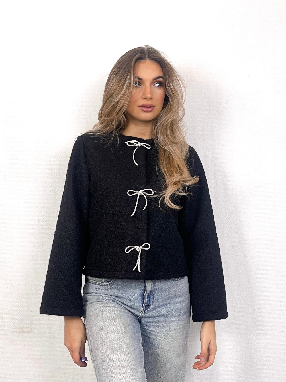 Black glitter bow sweater